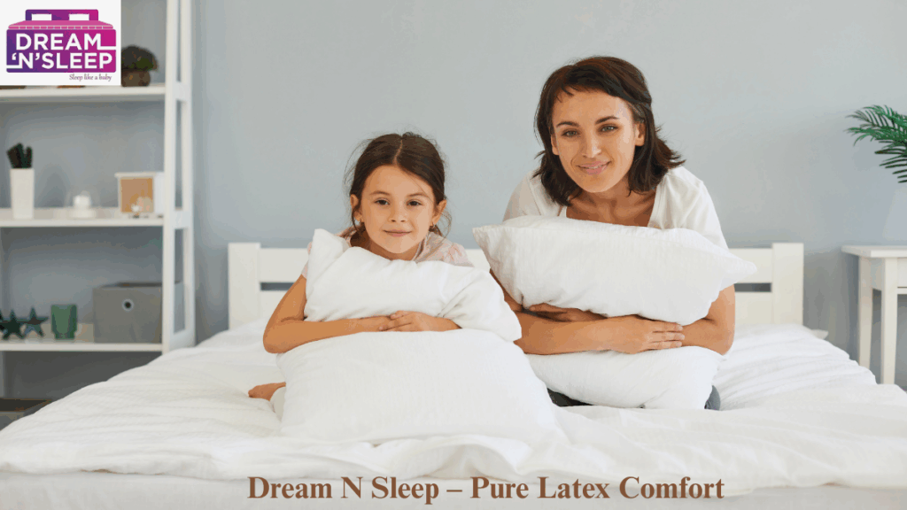 Mother and daughter playing and relaxing on Dream N Sleep mattress, enjoying comfort and quality sleep